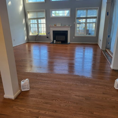 Hardwood Flooring in Large Space with Windows by MM Flooring in Crofton, MD